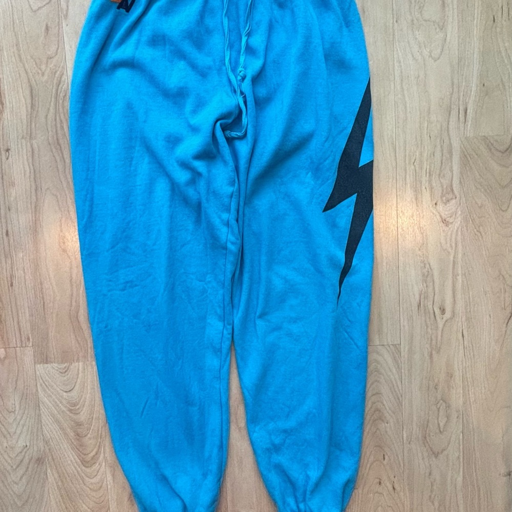 Aviator Nation Blue Track Joggers with Black Lightning Bolt
